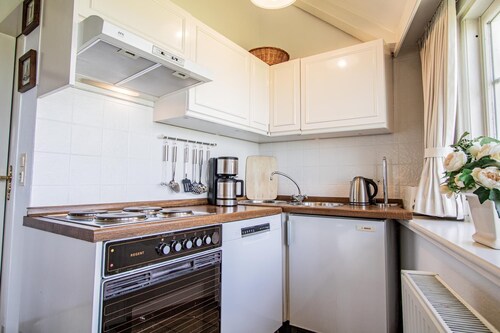 Old mill with a view of the mudflats