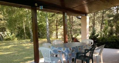 Holiday home with fenced-in waterside plot