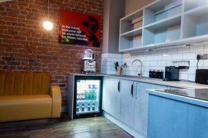 Exclusive Apartment, 1 Bedroom, Courtyard View | Living room | 70-inch TV with digital channels