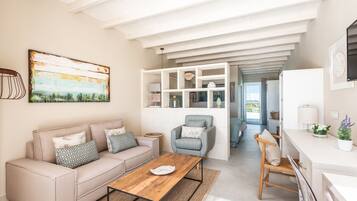Suite, Terraza | 1 habitación, ropa de cama de alta calidad y minibar