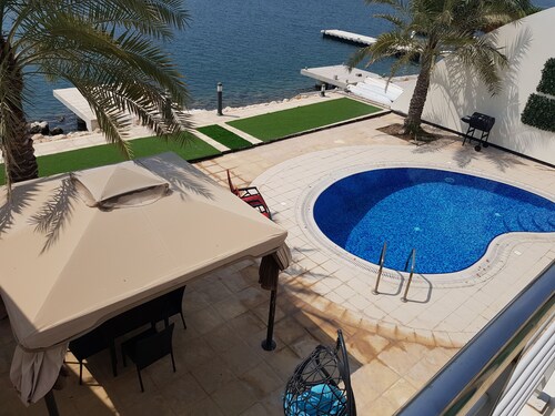 Luxury villa with private pier