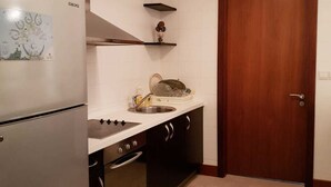 Deluxe Villa, 3 Bedrooms, Private Pool | Private kitchen | Full-size fridge, oven, electric kettle, cookware/dishes/utensils - Luxury villa with private pier (Durrat Al Bahrain)