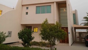 Front of property - Luxury villa with private pier (Durrat Al Bahrain)