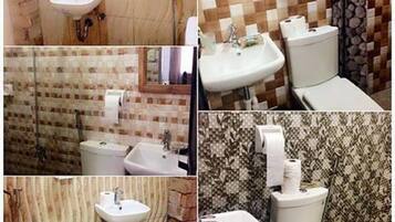 Chuveiro, toalhas de banho