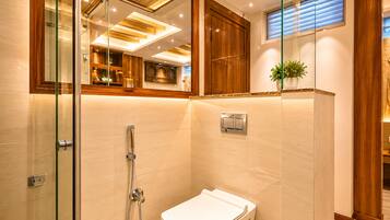 Deluxe Single Room | Bathroom | Separate bathtub and shower, rainfall showerhead, hair dryer, bathrobes