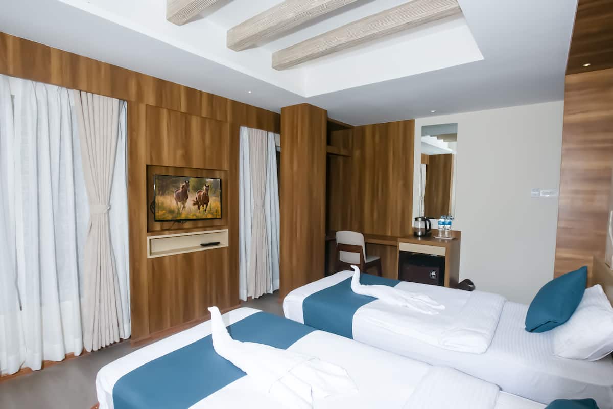 Hypo-allergenic bedding, pillow-top beds, minibar, in-room safe