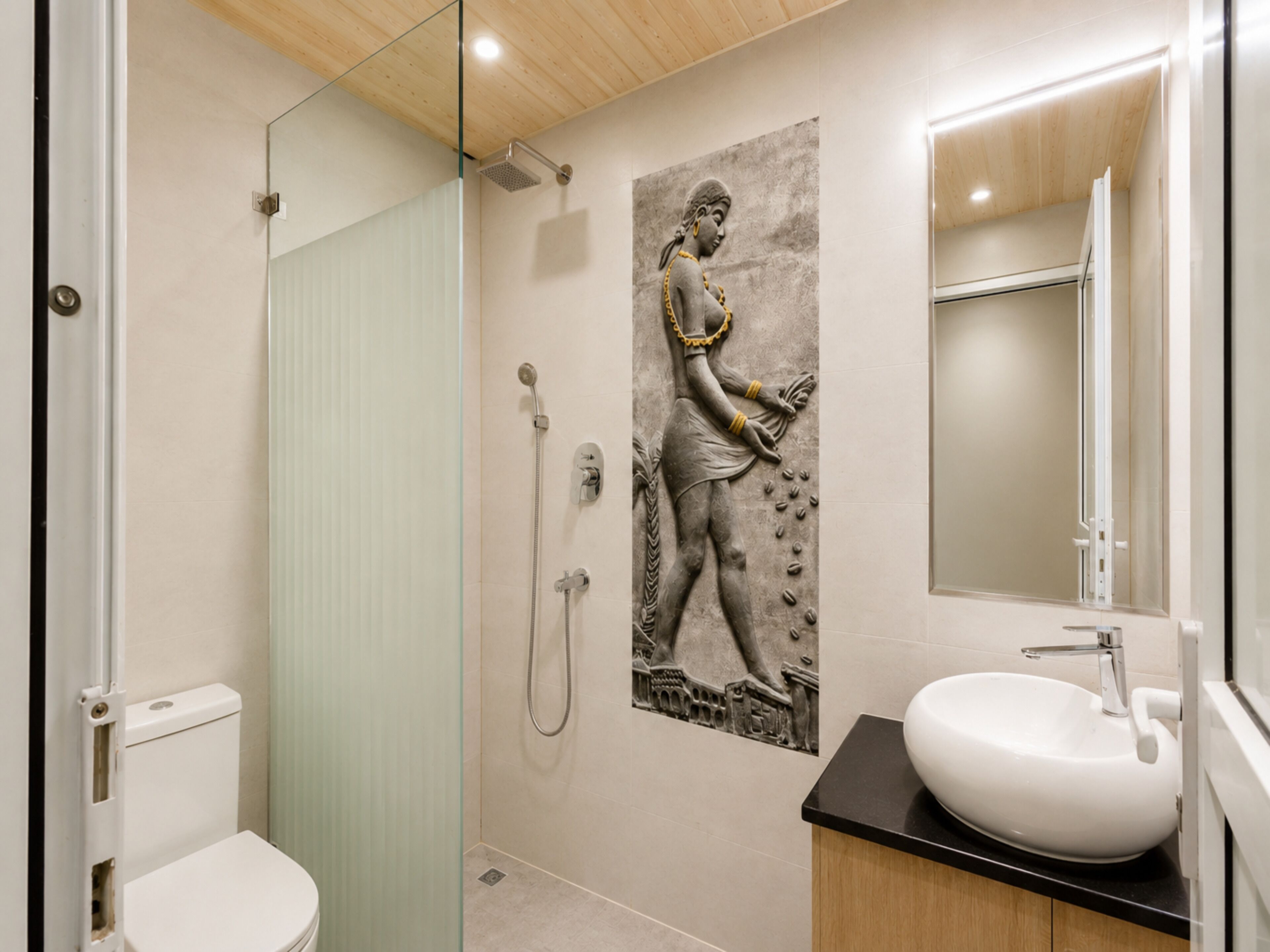 Separate bathtub and shower, rainfall showerhead, hair dryer, bathrobes
