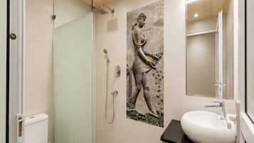 Separate tub and shower, rainfall showerhead, hair dryer, bathrobes