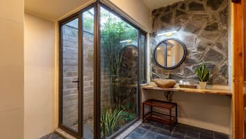 Shower, free toiletries, hair dryer, slippers