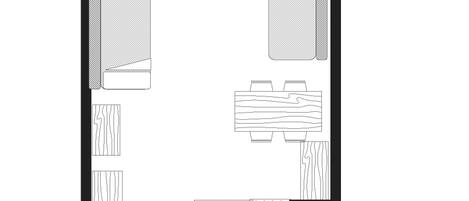 A floor plan with two bedrooms, a bathroom, a kitchen, and a living area.