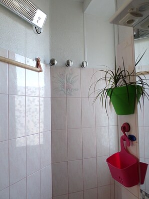 Shower, hair dryer, towels, soap