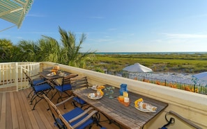 Outdoor dining - Villa Marisol: Beachfront, Mediterranean style, w/terrace, pool, hot tub! (Anna Maria)