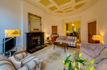 Beautiful lounge with quality furnishings - contemporary and period combined.