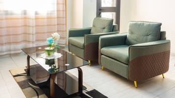 Apartment, 1 Bedroom | Living room | LCD TV