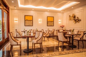 Breakfast, lunch, dinner served; local and international cuisine