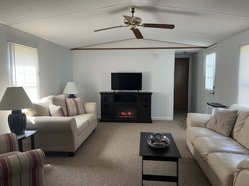 Near the water  and close to a  boat ramp