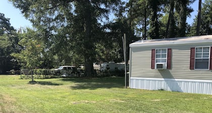 Near the water and close to a boat ramp