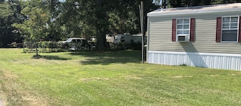Near the water and close to a boat ramp