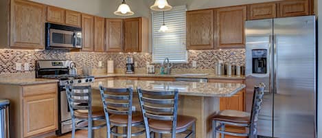 Coffee/tea maker, fridge, microwave, oven