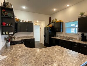 Coffee/tea maker, fridge, microwave, oven