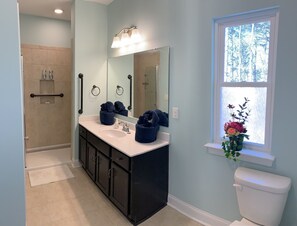 Shower, hair dryer, towels, soap