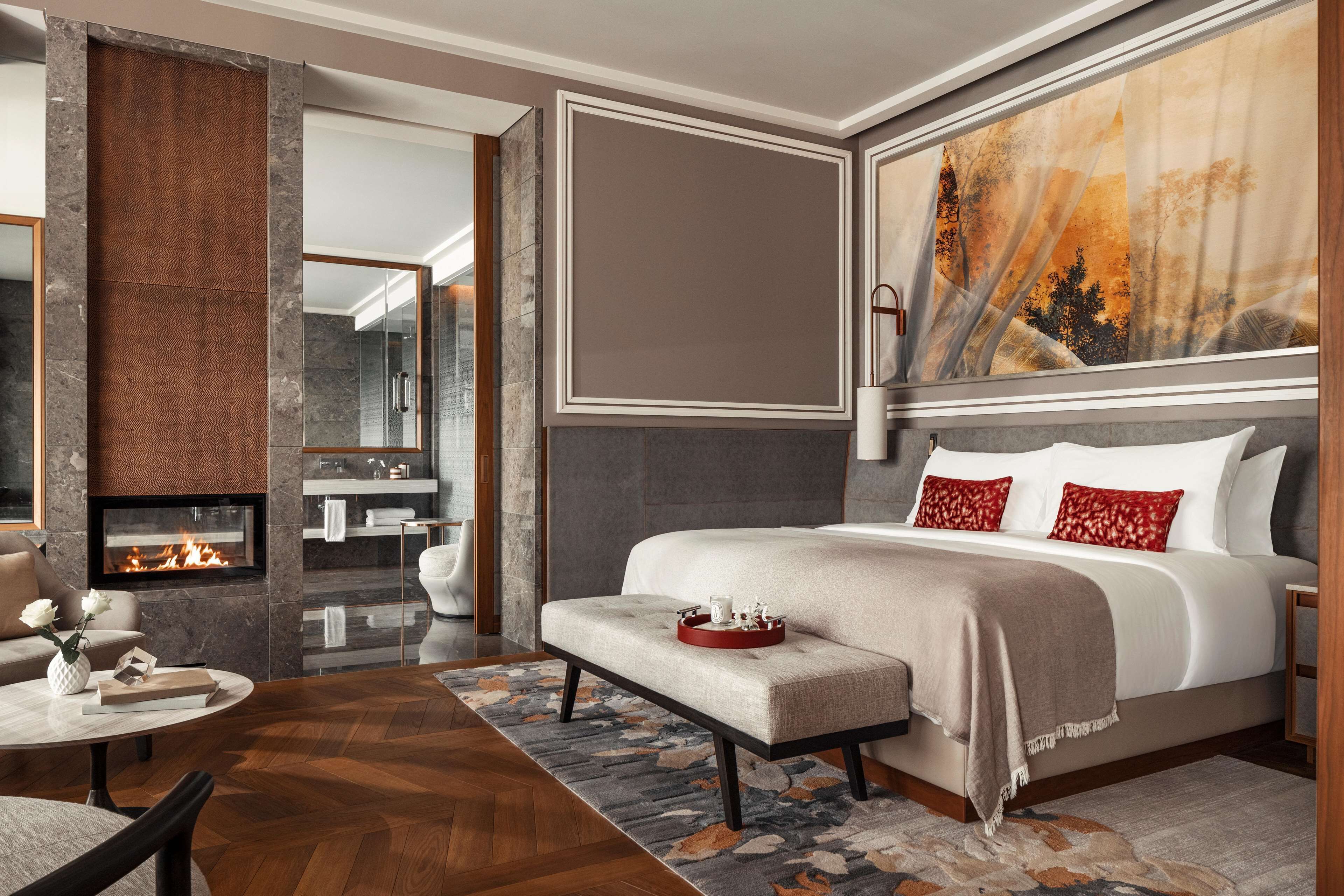 Premium bedding, down duvets, free minibar items, in-room safe