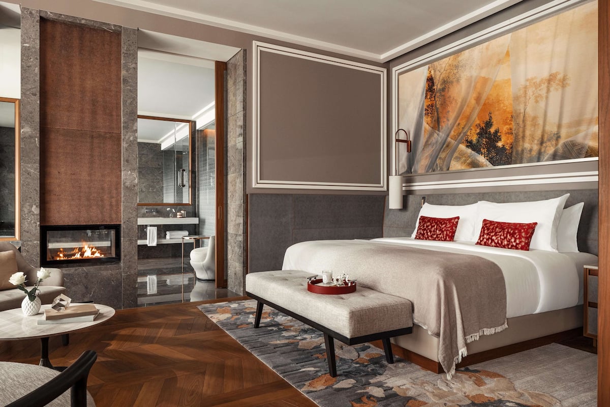 Premium bedding, down comforters, free minibar items, in-room safe
