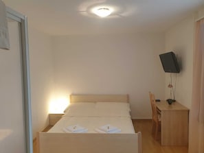 Quarto casal, banheiro compartilhado | Wi-Fi de cortesia