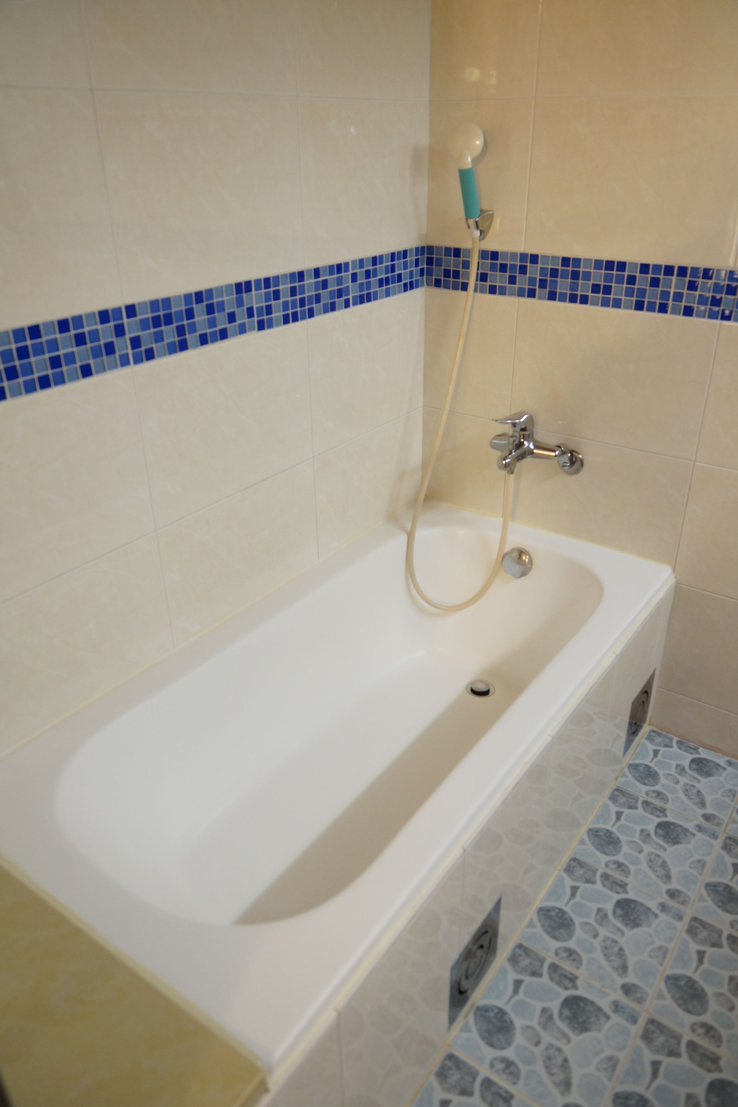 elite double room | bathroom | rainfall showerhead, hair dryer, slippers, towels
