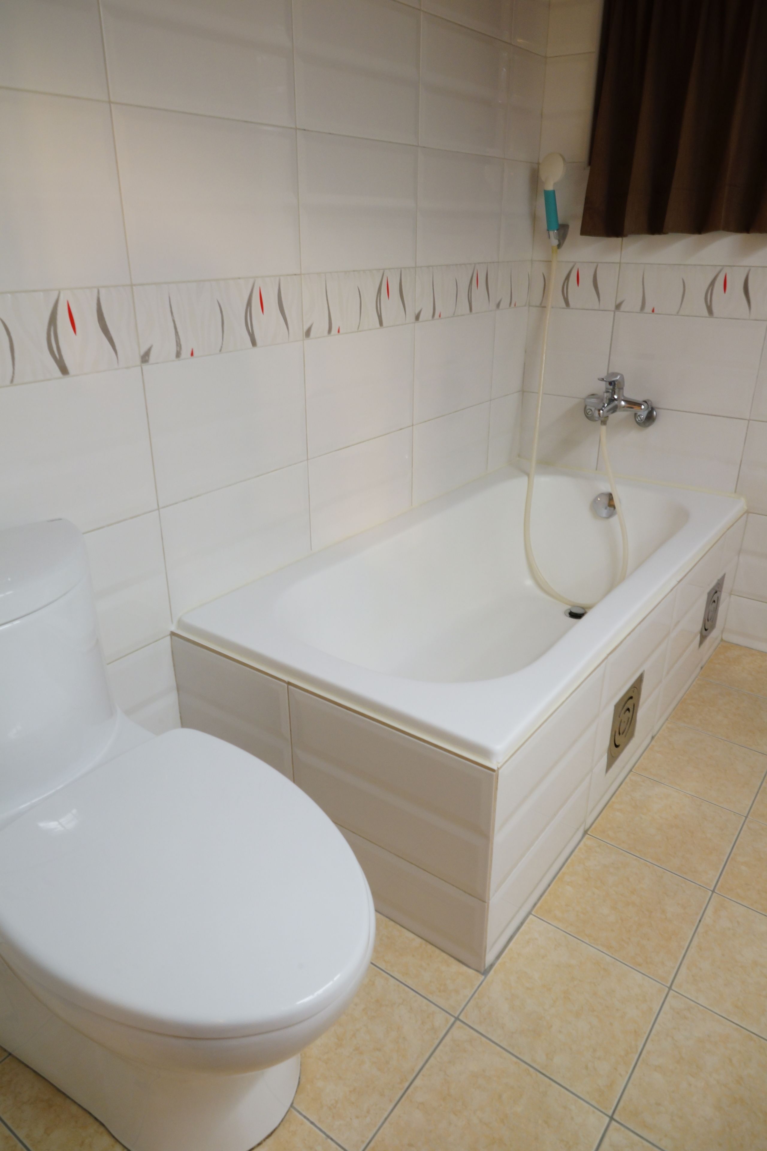 economy double room | bathroom | rainfall showerhead, hair dryer, slippers, towels