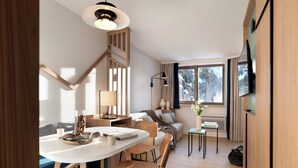 A modern interior with a dining area, sofa, TV, and a view of snowy mountains. - Résidence Pierre & Vacances Capella (Morzine)