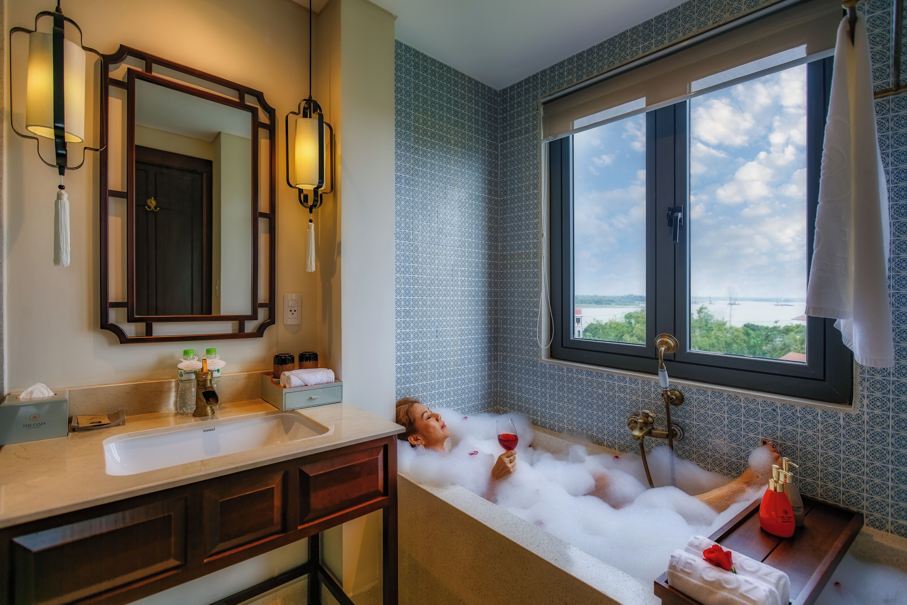 combined shower/bathtub, deep-soaking bathtub, rainfall showerhead