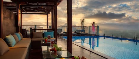 Outdoor pool, open 7:00 AM to 8:00 PM, sun loungers