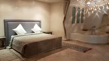 Executive Suite | Premium bedding, individually decorated, iron/ironing board, free WiFi