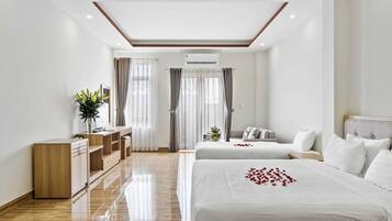 Family Triple Room, 1 Bedroom | Premium bedding, desk, laptop workspace, free WiFi