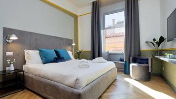 Deluxe Room | 1 bedroom, minibar, in-room safe, desk