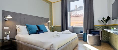 Habitació Deluxe | Llençols de cotó egipci, roba de llit d'alta qualitat i cobrellits