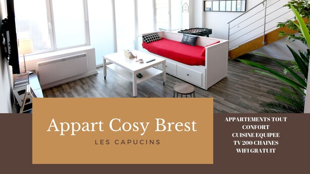 A modern apartment with a sofa, a small table, and a TV. It has large windows, a staircase, and potted plants. - Appart Cosy Brest Les Capucins (Brest)