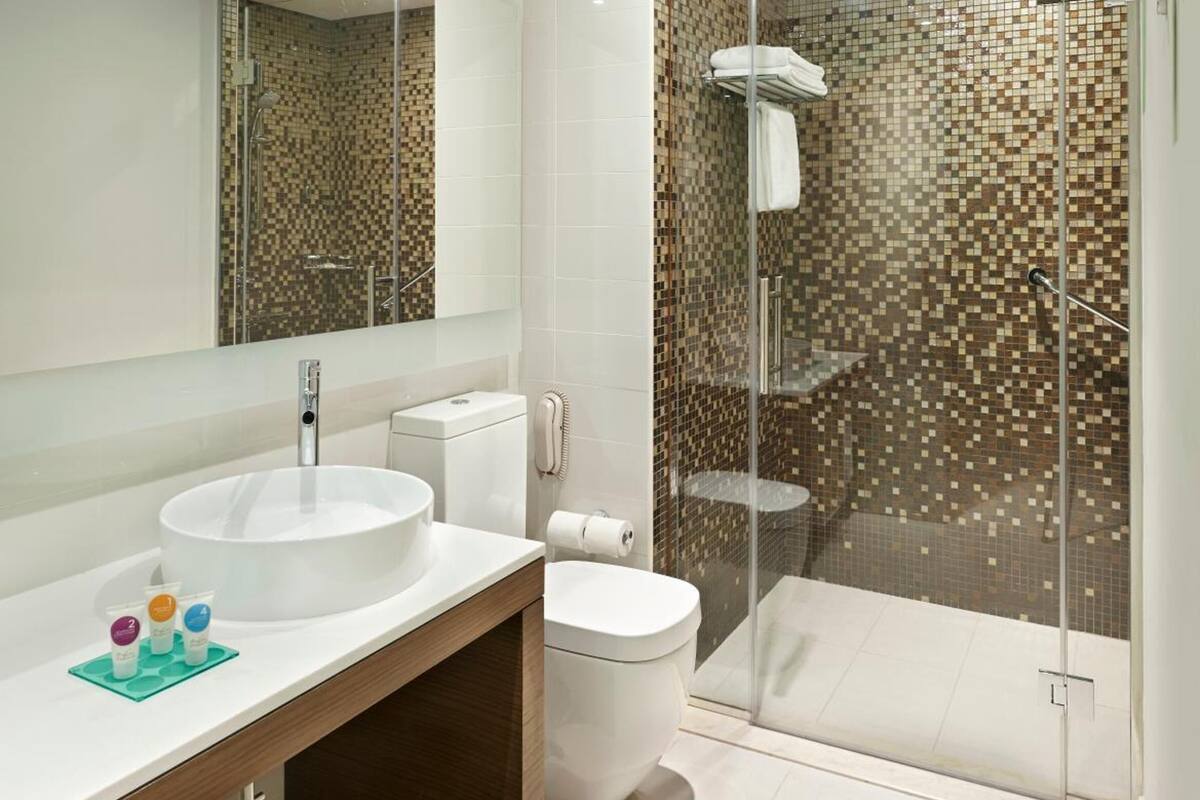 deep-soaking bathtub, hair dryer, bathrobes, bidet