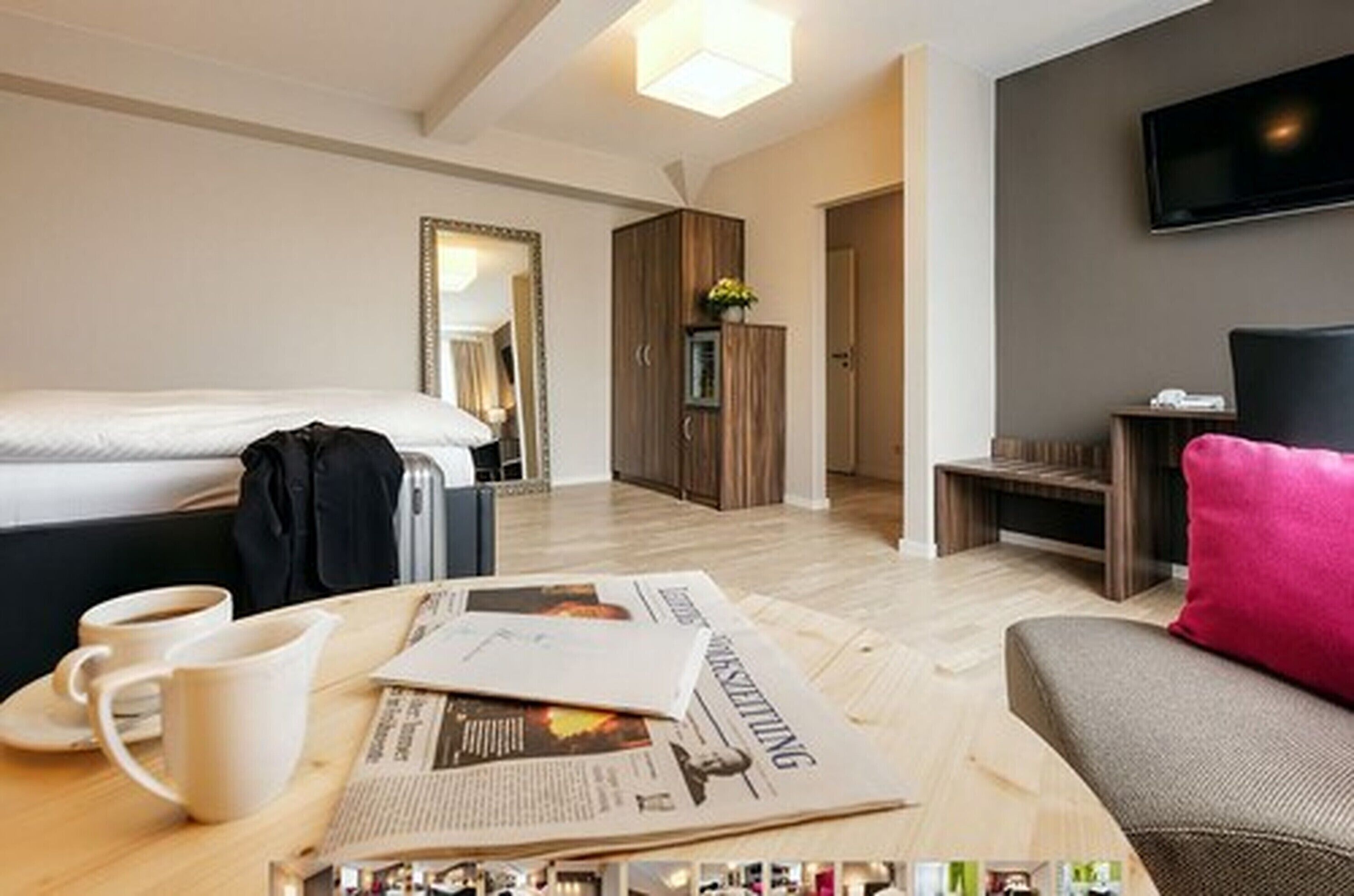 junior suite | living area | flat-screen tv