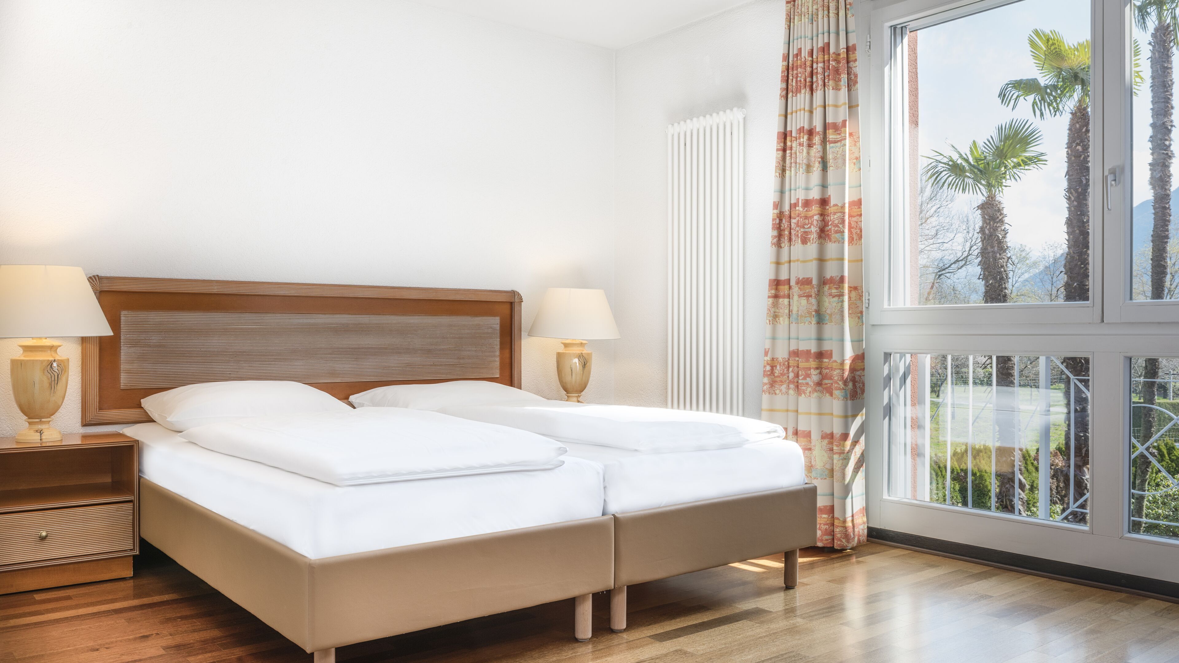 Hypo-allergenic bedding, down comforters, in-room safe, desk