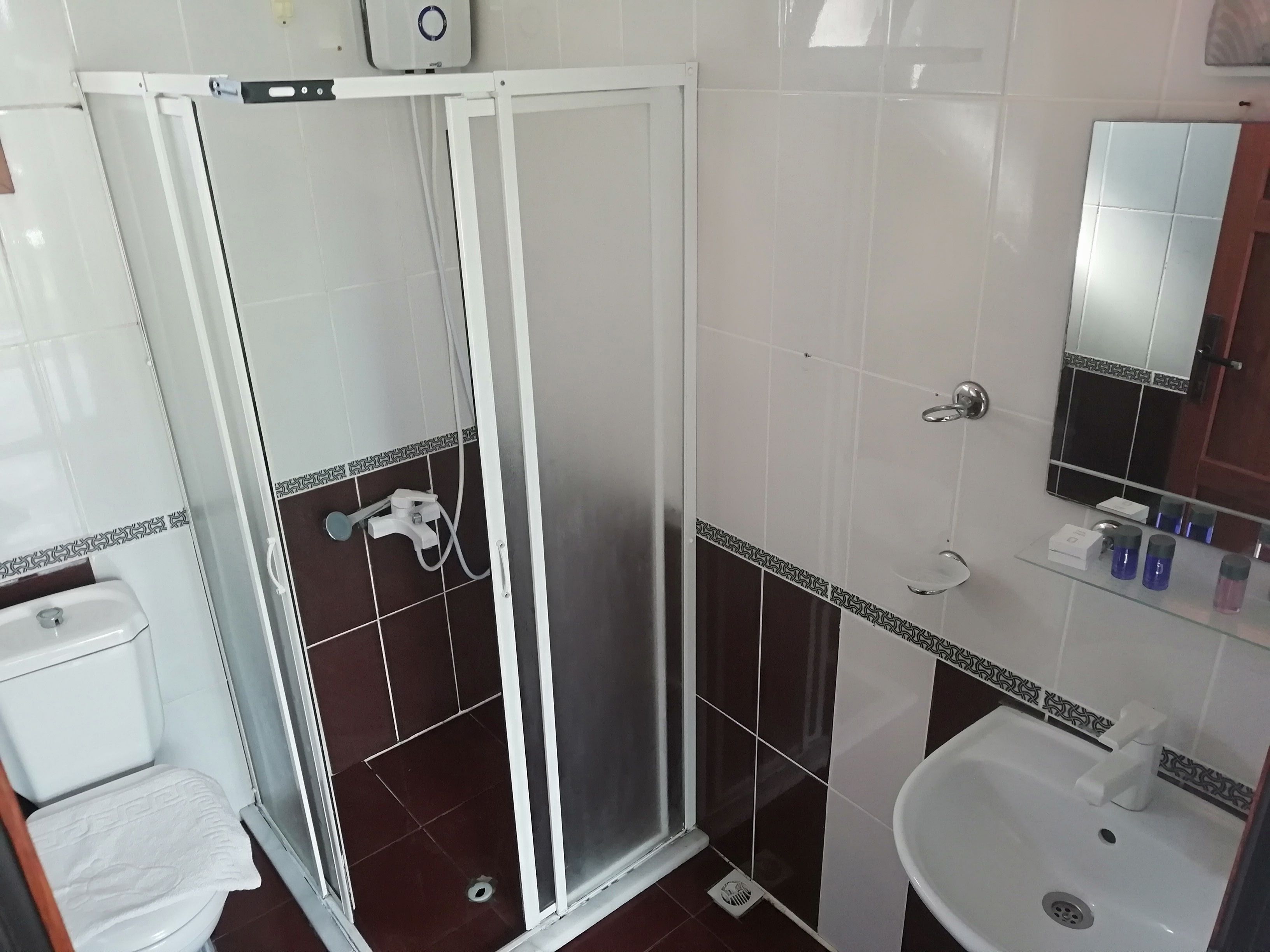 shower, free toiletries, hair dryer, slippers