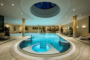 Indoor pool, open 7:00 AM to 7:00 PM, sun loungers
