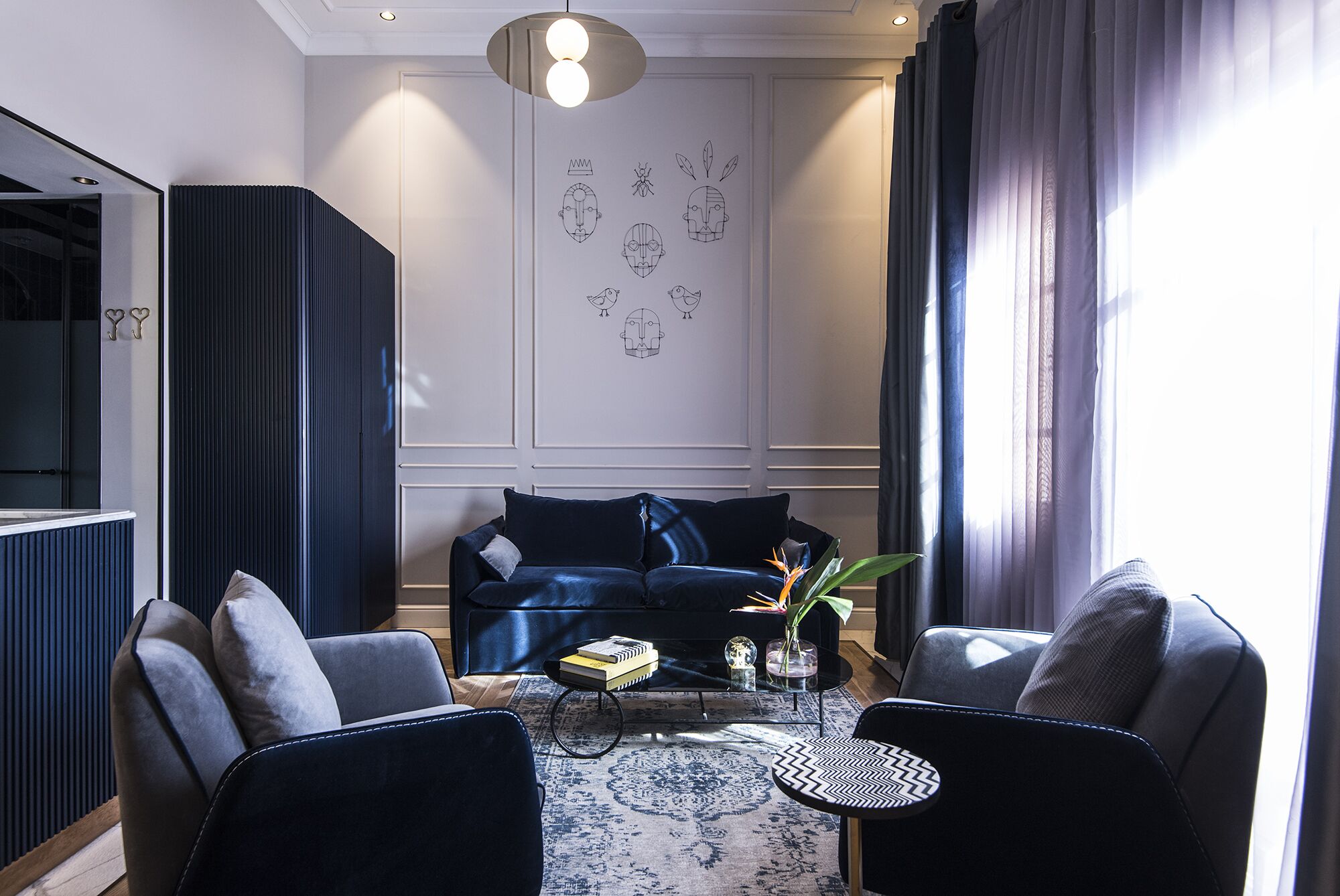 deluxe suite | living area | smart tv, first-run films, pay films