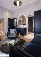 Deluxe Suite | Living area | 43-inch Smart TV with satellite channels, TV, first-run movies