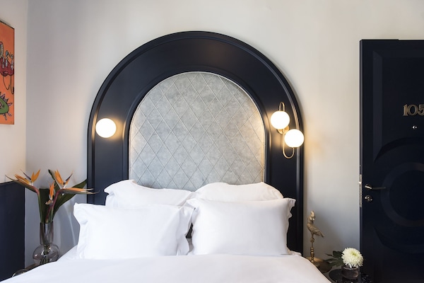 Classic Double Room | 1 bedroom, minibar, in-room safe, individually decorated