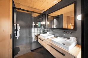 Superior Apartment, 3 Bedrooms | Bathroom | Bathrobes, slippers, bidet, towels - Gstaad Residence by Swiss Hotel Apartments (Saanen)