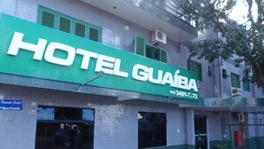 A hotel named HOTEL GUÁBA with a green signboard and a contact number. - Hotel Guaíba (Guaiba)
