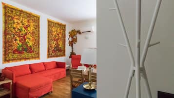 Apartment (1 Bedroom) | Living room | Flat-screen TV
