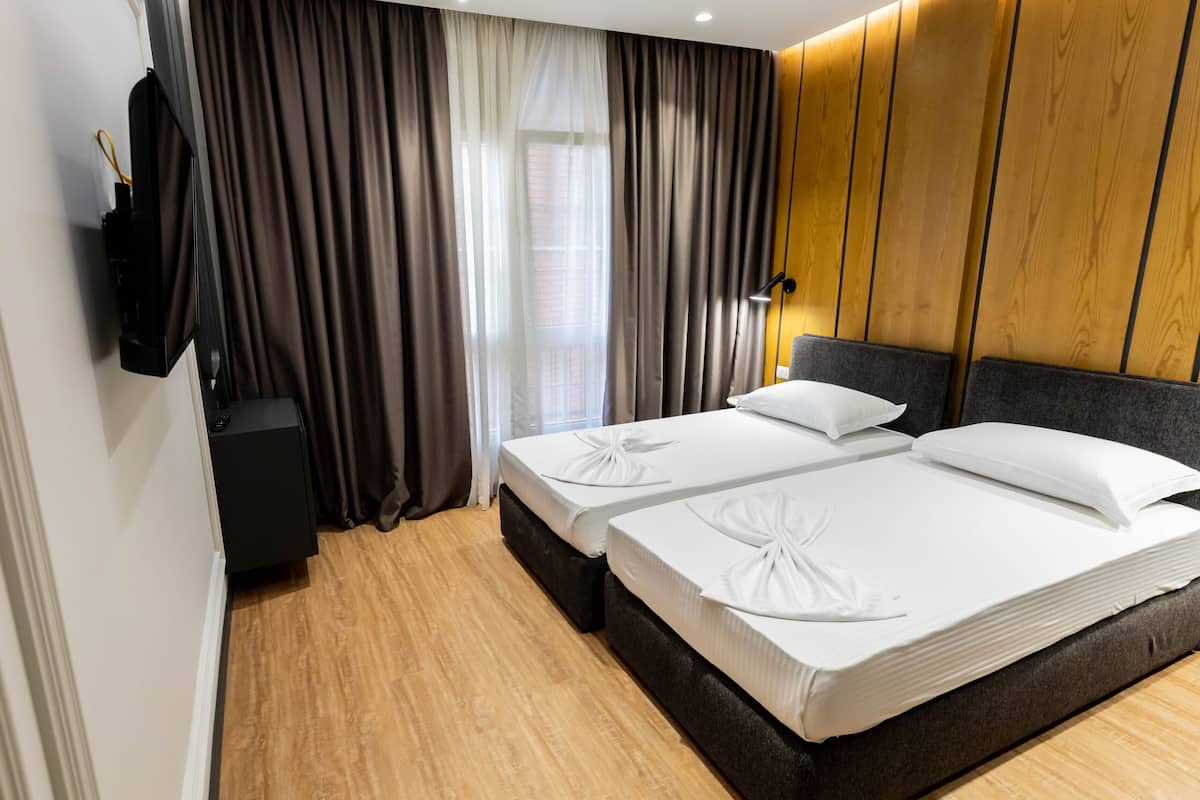 Camera Economy con letto matrimoniale o 2 letti singoli | Wi-Fi gratuito